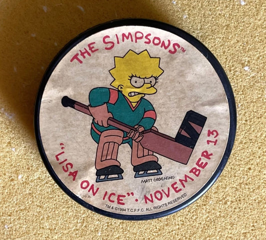 VERY RARE 1994 The Simpsons Lisa Simpson on Ice episode official NHL Hockey Puck Promotional set from Fox Televison